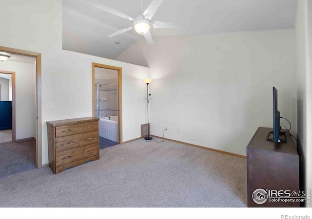 carpeted bedroom with a ceiling fan, baseboards, and vaulted ceiling