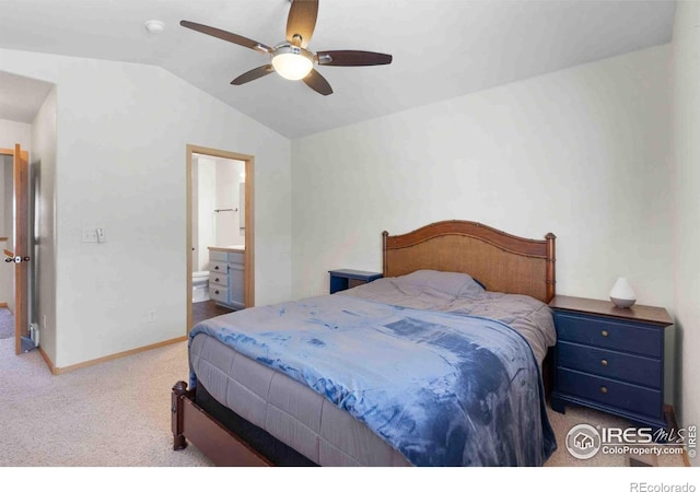 bedroom featuring baseboards, carpet floors, ensuite bath, lofted ceiling, and ceiling fan