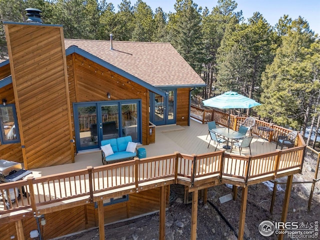 82 Grove Ct, Boulder, CO 80302 - wooden terrace featuring outdoor dining area and french doors