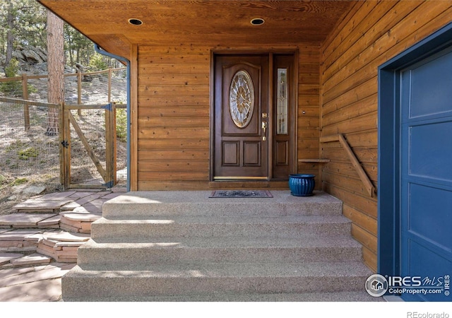 82 Grove Ct, Boulder, CO 80302 - view of exterior entry with fence