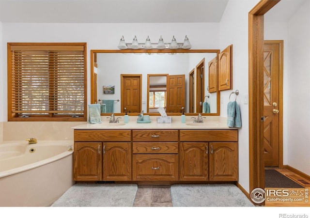 82 Grove Ct, Boulder, CO 80302 - bathroom with double vanity and a bath