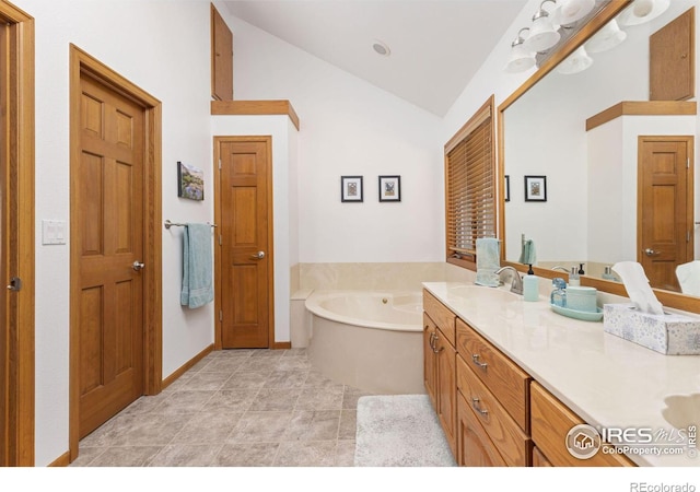 82 Grove Ct, Boulder, CO 80302 - full bathroom featuring vaulted ceiling, a bath, and double vanity