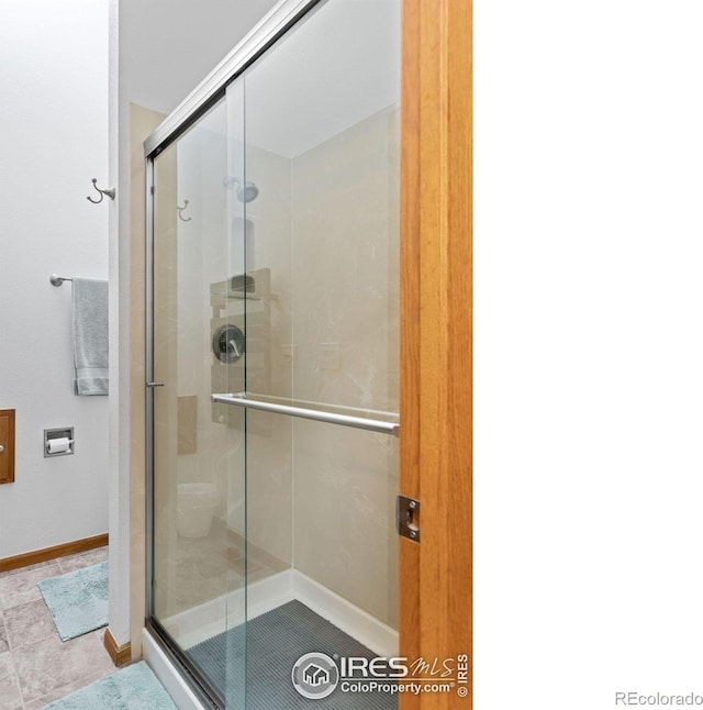 82 Grove Ct, Boulder, CO 80302 - full bath with a shower stall and baseboards