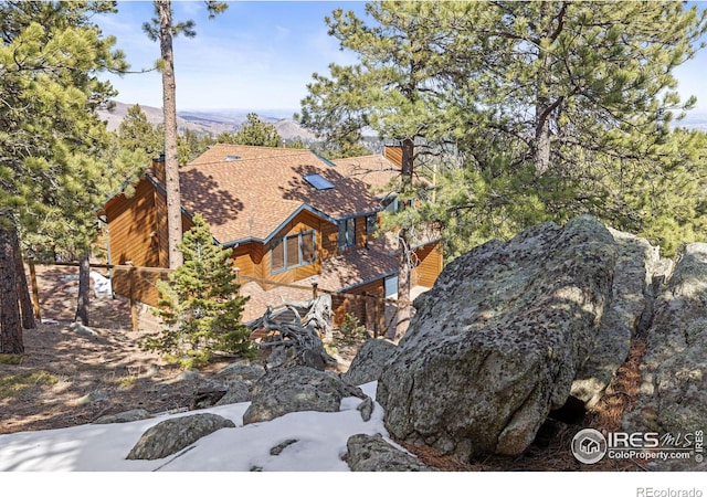 82 Grove Ct, Boulder, CO 80302 - view of front facade featuring roof with shingles