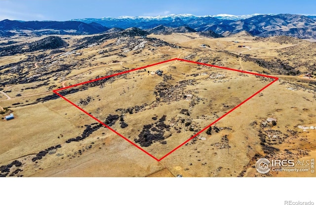 bird's eye view featuring view of desert and a mountain view