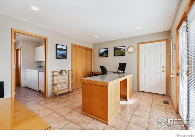 office area with light tile patterned floors, visible vents, recessed lighting, and washer and clothes dryer