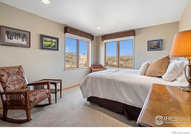 bedroom featuring recessed lighting, baseboards, and carpet floors