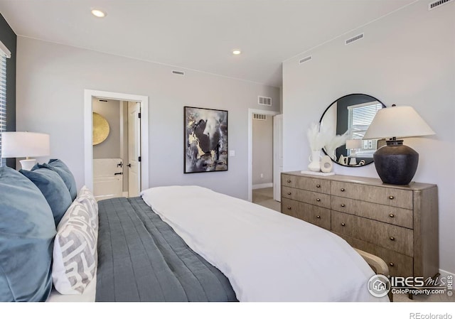 bedroom featuring recessed lighting and visible vents