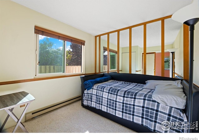 bedroom featuring a baseboard radiator