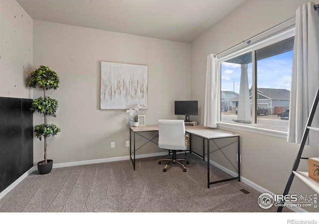 office area featuring carpet flooring and baseboards