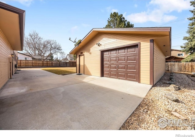 detached garage with fence