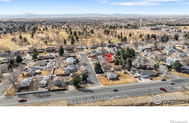 drone / aerial view featuring a mountain view and a residential view