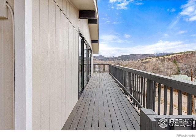 deck with a mountain view