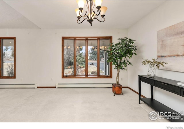 interior space featuring a wealth of natural light, carpet floors, and a baseboard radiator