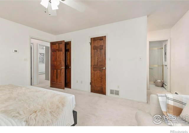 carpeted bedroom featuring ceiling fan, visible vents, and a baseboard heating unit