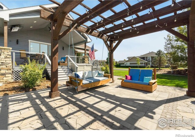 view of patio featuring an outdoor hangout area and a pergola