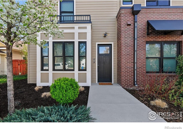 302 N Meldrum St Unit 103, Fort Collins, CO 80521 - property entrance featuring brick siding