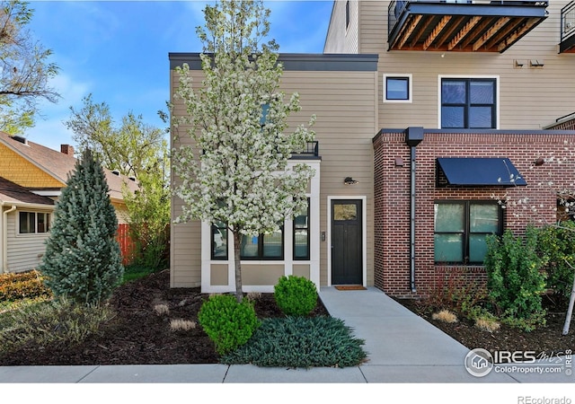 302 N Meldrum St Unit 103, Fort Collins, CO 80521 - view of front of home with brick siding