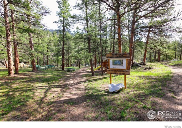 view of home's community featuring playground community