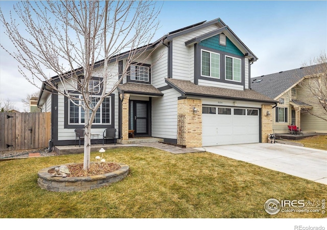 traditional-style home with fence, driveway, a front lawn, a garage, and brick siding