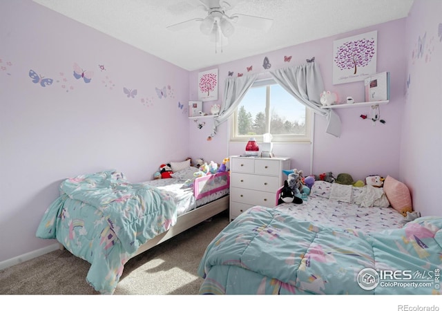 bedroom featuring carpet, baseboards, and ceiling fan