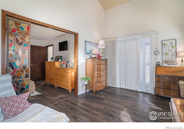 bedroom featuring wood finished floors