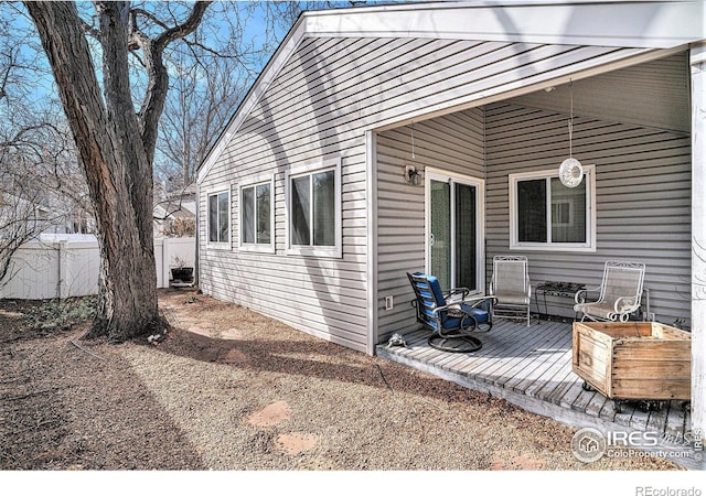 view of property exterior with fence