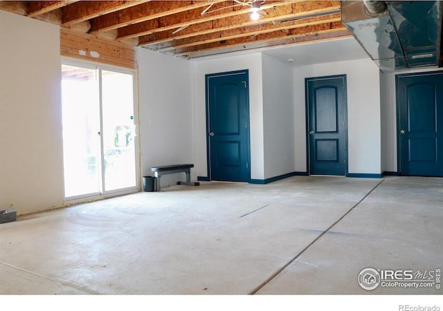 interior space featuring concrete floors