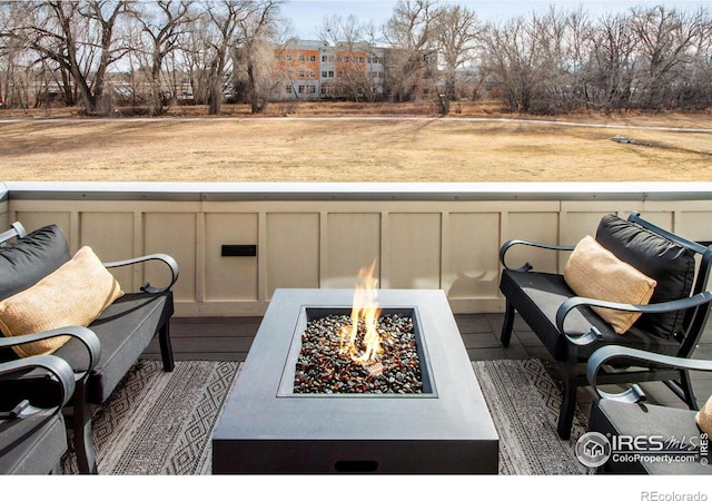 exterior space with an outdoor fire pit