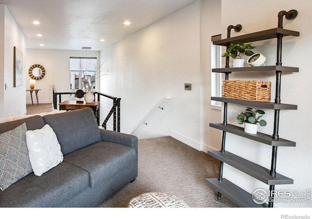 living area featuring recessed lighting, baseboards, and carpet floors