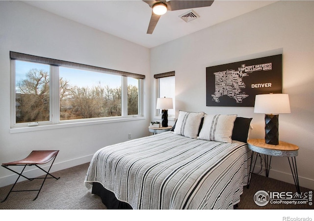 bedroom with visible vents, a ceiling fan, carpet, and baseboards