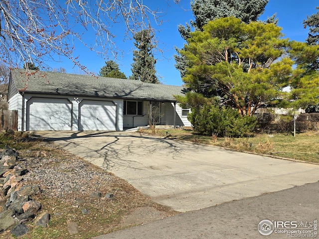 exterior space with concrete driveway