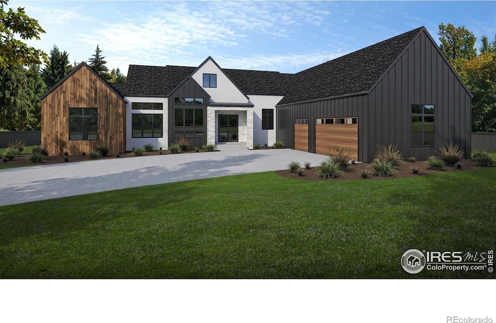 modern inspired farmhouse featuring a garage, board and batten siding, concrete driveway, and a front yard