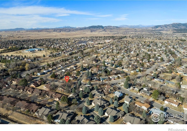 bird's eye view with a residential view and a mountain view