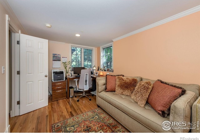 office area with crown molding, recessed lighting, and light wood finished floors