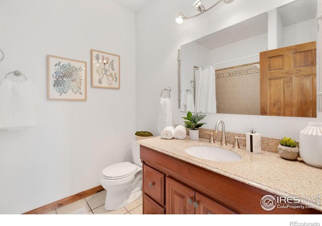 bathroom featuring vanity, baseboards, tile patterned flooring, curtained shower, and toilet