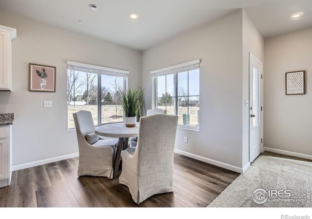 143 Robin Rd, Johnstown, CO 80534 - dining space with recessed lighting, baseboards, and dark wood finished floors
