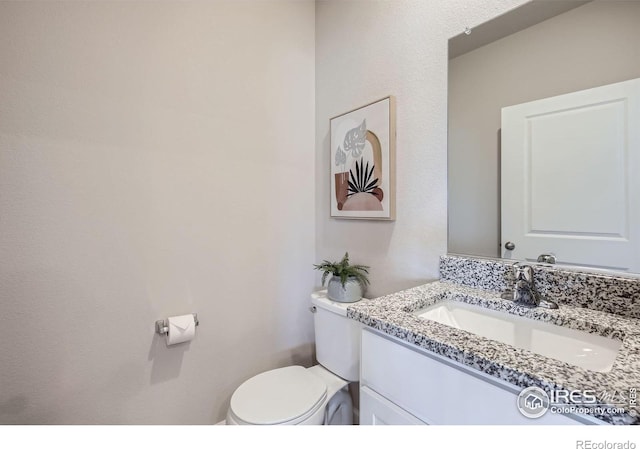 143 Robin Rd, Johnstown, CO 80534 - bathroom featuring toilet and vanity
