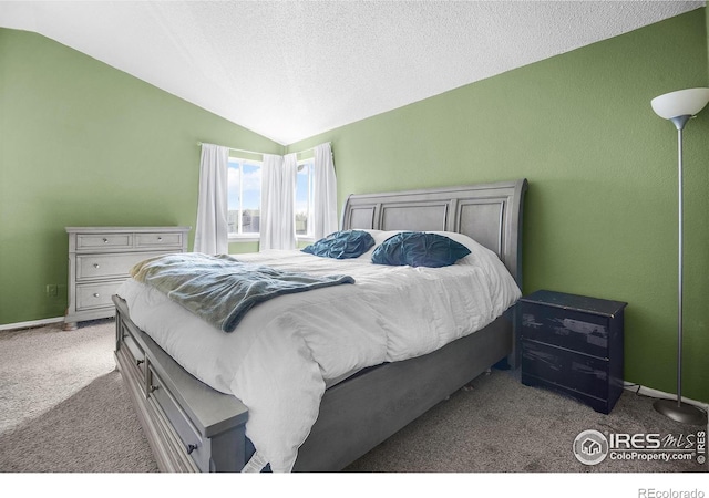 bedroom with baseboards, a textured ceiling, carpet, and vaulted ceiling