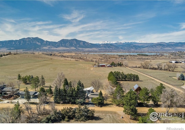 view of mountain feature with a rural view