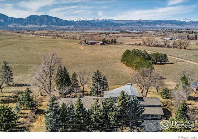 bird's eye view with a rural view and a mountain view