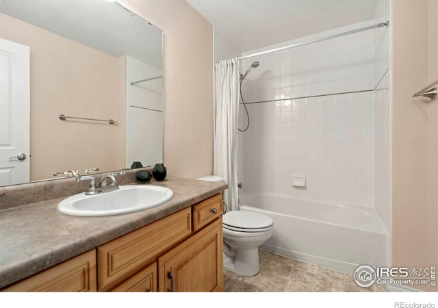 bathroom featuring vanity, toilet, and shower / bath combo with shower curtain