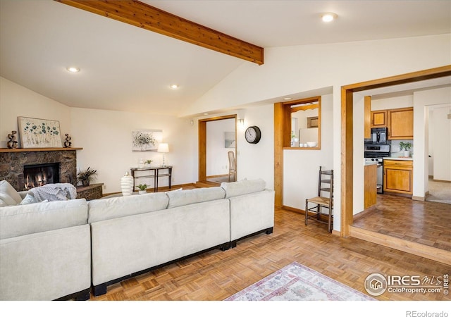 living room with a stone fireplace, vaulted ceiling with beams, recessed lighting, and baseboards