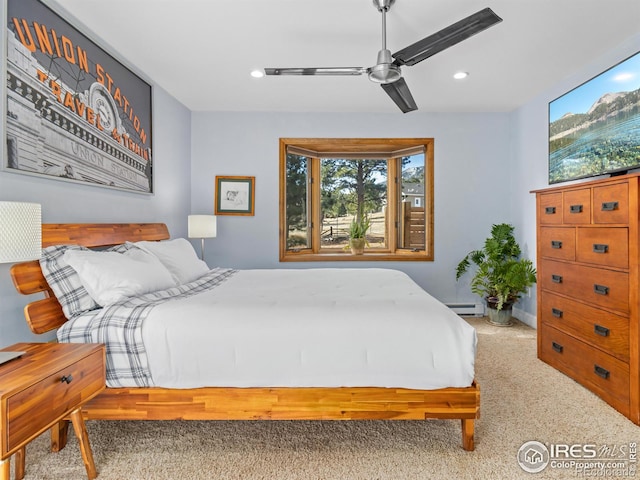 bedroom featuring recessed lighting, a baseboard heating unit, carpet, and ceiling fan