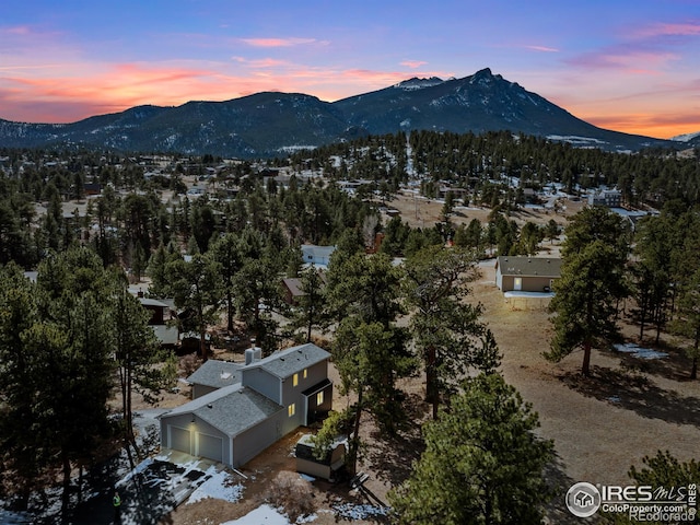 aerial view at dusk with a mountain view