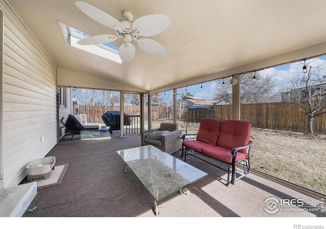 view of patio with grilling area, a ceiling fan, and a fenced backyard