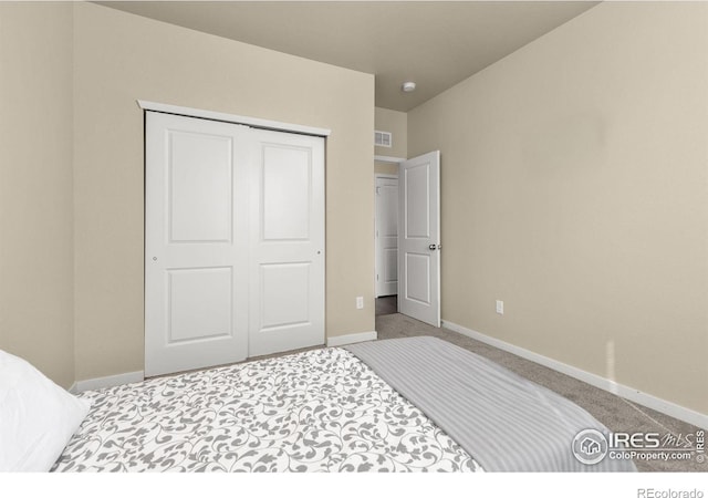3948 Hackberry St, Wellington, CO 80549 - carpeted bedroom with a closet, visible vents, and baseboards