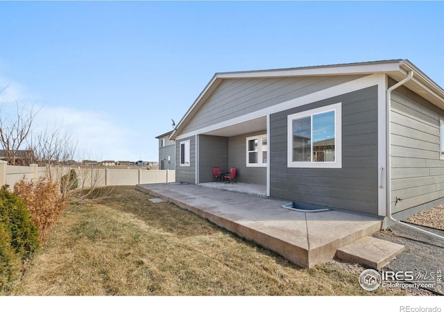3948 Hackberry St, Wellington, CO 80549 - rear view of property with a patio area, a yard, and fence