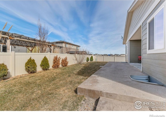 3948 Hackberry St, Wellington, CO 80549 - view of yard featuring a patio and a fenced backyard