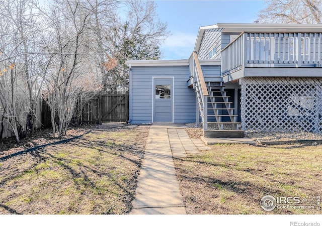 exterior space with stairs and fence